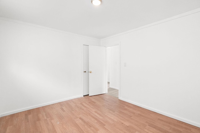 69 Hutson St, Wilkes Barre, PA 18702 - unfurnished room with light wood-type flooring, ornamental molding, and baseboards