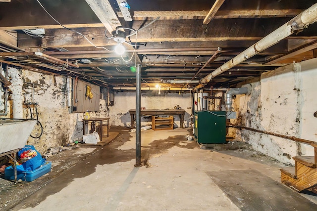 69 Hutson St, Wilkes Barre, PA 18702 - unfinished below grade area with a heating unit and a sink
