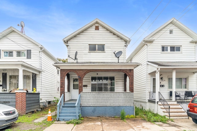 69 Hutson St, Wilkes Barre, PA 18702 - shotgun-style home featuring covered porch
