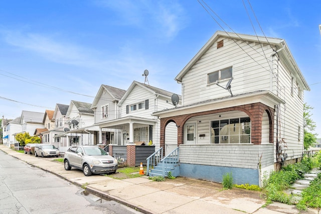69 Hutson St, Wilkes Barre, PA 18702 - view of front of home featuring covered porch and a residential view