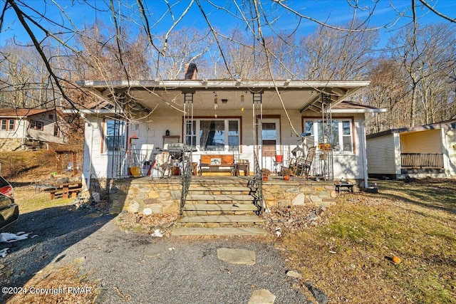 view of front of house featuring covered porch