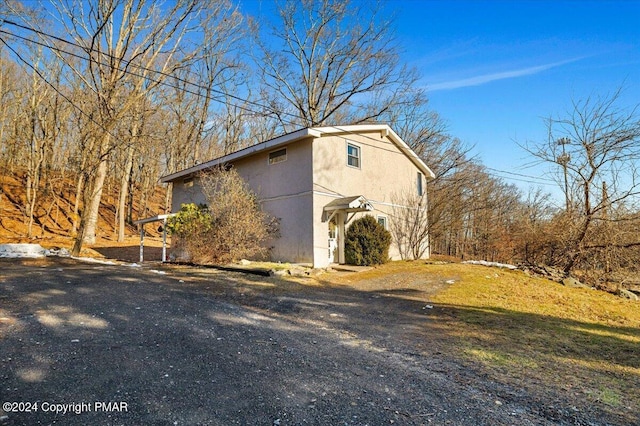 view of property exterior featuring stucco siding