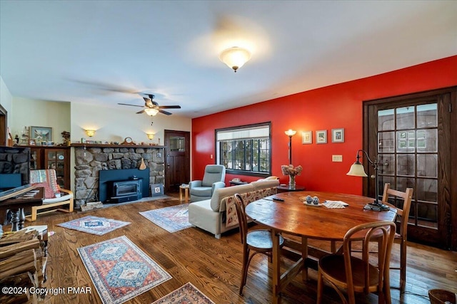 living room featuring ceiling fan and wood finished floors