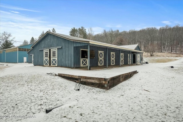 exterior space with an outbuilding and an exterior structure