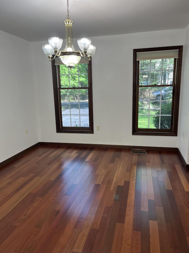 3813 Foxborough Ct, Stroudsburg, PA 18360 - unfurnished room featuring a chandelier and dark wood-style floors