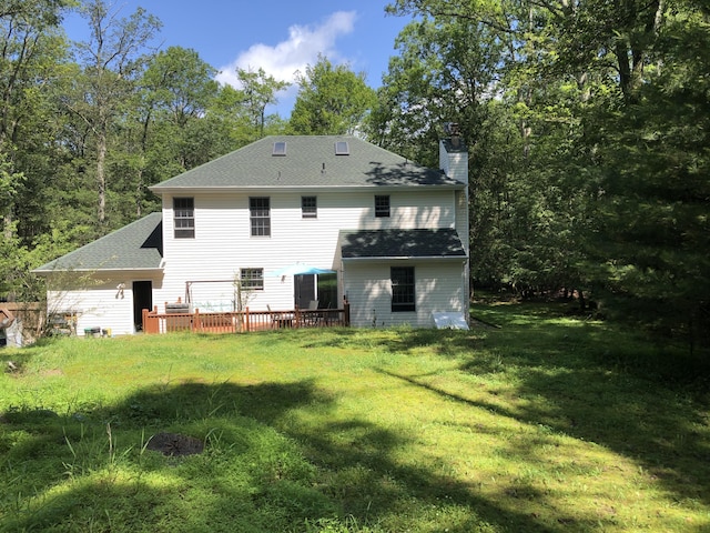 3813 Foxborough Ct, Stroudsburg, PA 18360 - rear view of property with a chimney, roof with shingles, a yard, and a deck