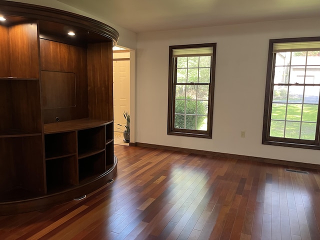 3813 Foxborough Ct, Stroudsburg, PA 18360 - unfurnished living room with plenty of natural light and dark wood finished floors