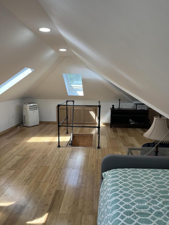 3813 Foxborough Ct, Stroudsburg, PA 18360 - bedroom with a skylight, lofted ceiling, light wood finished floors, and recessed lighting