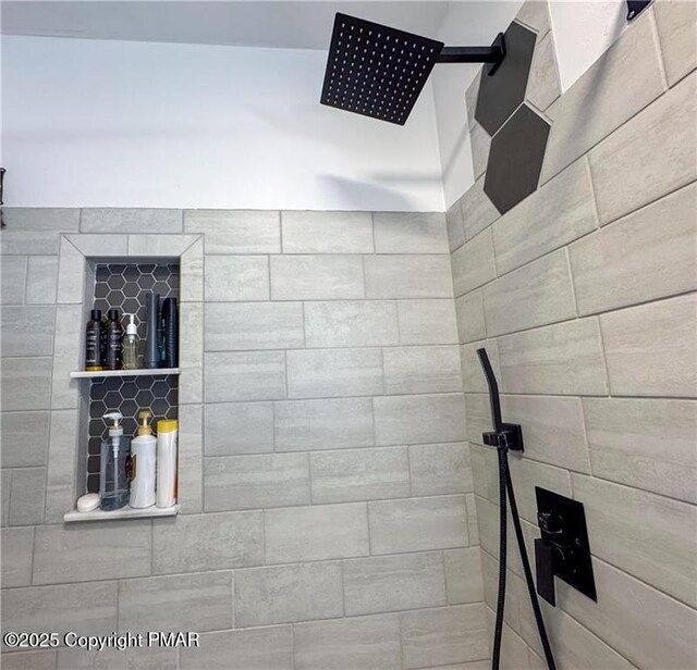 interior space featuring a tile shower