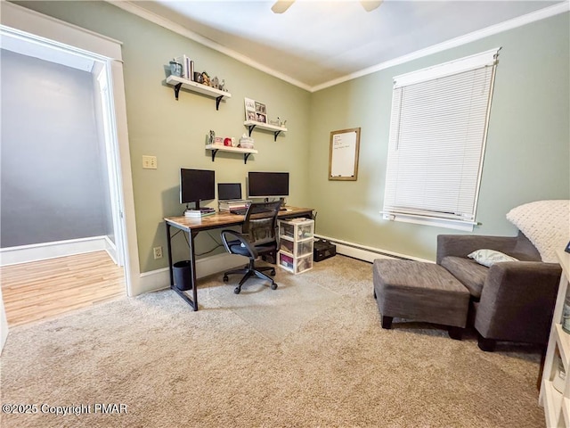 home office featuring light carpet, ceiling fan, crown molding, and a baseboard heating unit