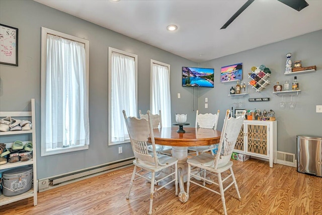 489 Sportsman Club Rd, Nazareth, PA 18064 - dining area with baseboard heating and wood finished floors