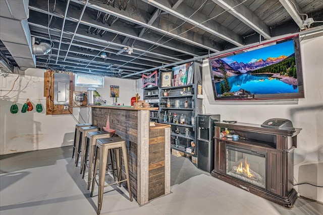 489 Sportsman Club Rd, Nazareth, PA 18064 - indoor dry bar featuring electric panel and a lit fireplace