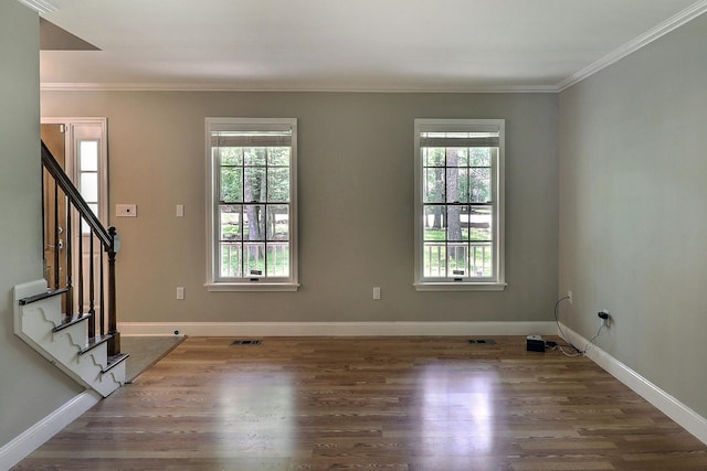 102 Crest Cir E, Stroudsburg, PA 18301 - entrance foyer featuring plenty of natural light, wood finished floors, ornamental molding, and stairway