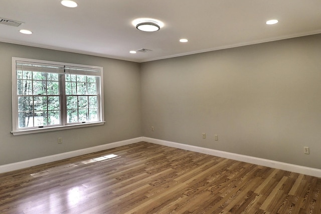 102 Crest Cir E, Stroudsburg, PA 18301 - spare room with wood finished floors, recessed lighting, and crown molding