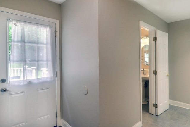 102 Crest Cir E, Stroudsburg, PA 18301 - entryway featuring baseboards and light tile patterned floors