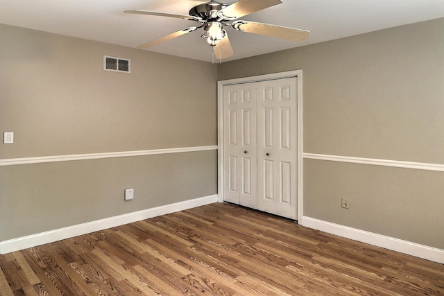 102 Crest Cir E, Stroudsburg, PA 18301 - unfurnished bedroom with wood finished floors, a closet, and a ceiling fan