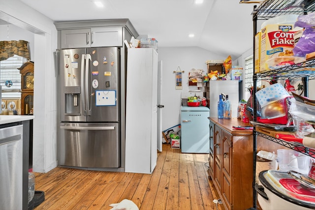 10 S Broad St, Bangor, PA 18013 - kitchen with stainless steel appliances, vaulted ceiling, light wood finished floors, recessed lighting, and gray cabinets
