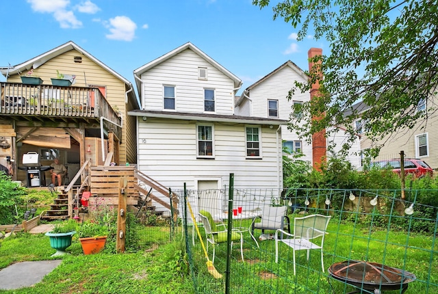 10 S Broad St, Bangor, PA 18013 - rear view of house with stairway, a fire pit, and a wooden deck