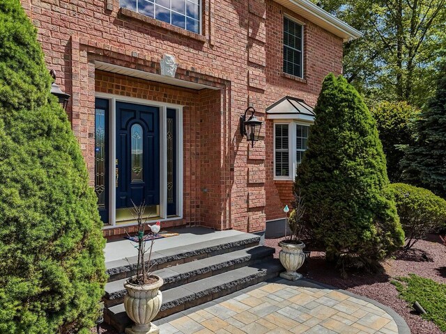 1376 Buck Ridge Dr, Stroudsburg, PA 18360 - property entrance with brick siding