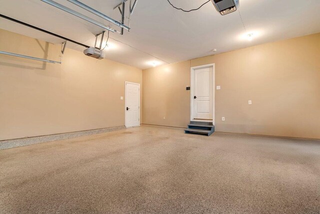1376 Buck Ridge Dr, Stroudsburg, PA 18360 - garage featuring a garage door opener and baseboards