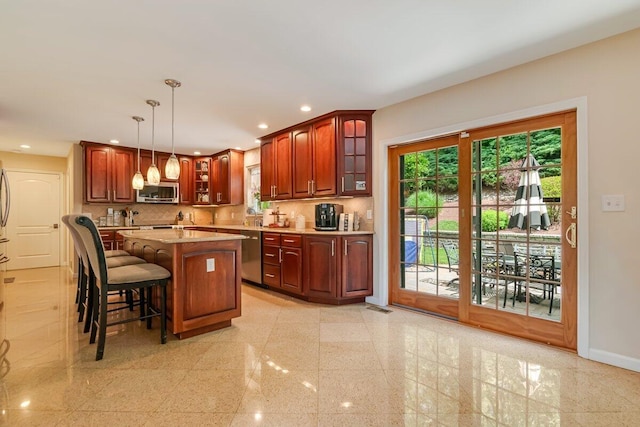 1376 Buck Ridge Dr, Stroudsburg, PA 18360 - kitchen with appliances with stainless steel finishes, granite floors, glass insert cabinets, healthy amount of natural light, and recessed lighting