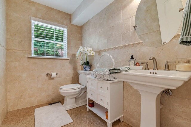 1376 Buck Ridge Dr, Stroudsburg, PA 18360 - bathroom with tile walls and toilet