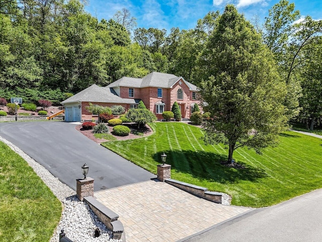 1376 Buck Ridge Dr, Stroudsburg, PA 18360 - view of front of property with a front lawn, driveway, and brick siding