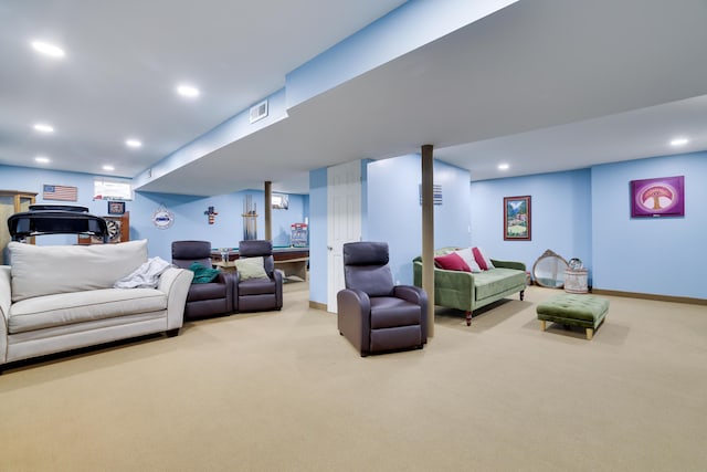 carpeted living room with visible vents, recessed lighting, and baseboards