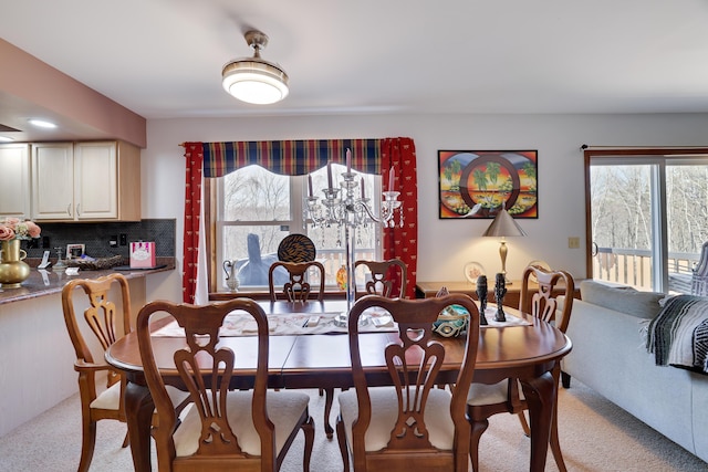 dining area featuring carpet floors