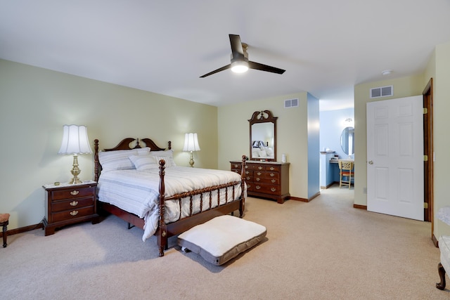 bedroom with carpet, visible vents, and baseboards