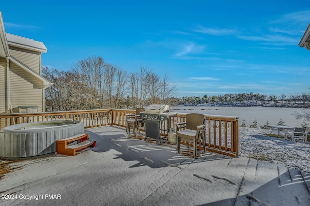 deck featuring grilling area and central AC unit