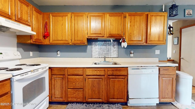 619 Rimrock Rd, Bartonsville, PA 18321 - kitchen with white appliances, under cabinet range hood, and light countertops