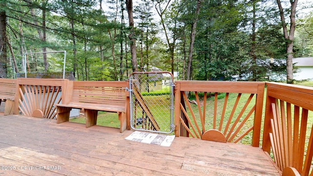 619 Rimrock Rd, Bartonsville, PA 18321 - wooden terrace featuring view of wooded area
