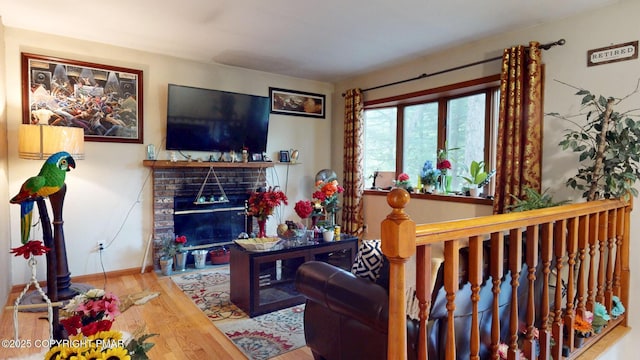 619 Rimrock Rd, Bartonsville, PA 18321 - living room with wood finished floors and a fireplace