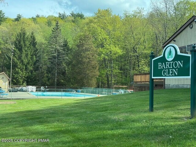 619 Rimrock Rd, Bartonsville, PA 18321 - view of property's community with a swimming pool and a forest view