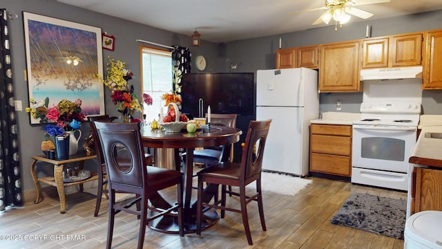 619 Rimrock Rd, Bartonsville, PA 18321 - kitchen with white appliances, under cabinet range hood, light wood finished floors, and a ceiling fan