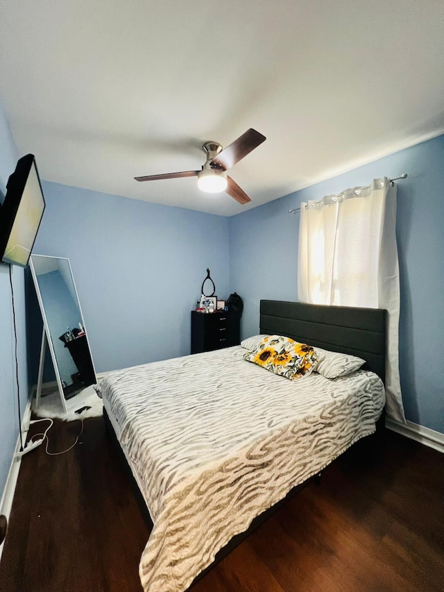 1116 Diamond Ave, Scranton, PA 18508 - bedroom with wood finished floors, ceiling fan, and baseboards
