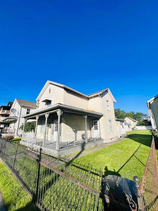 1116 Diamond Ave, Scranton, PA 18508 - rear view of house with covered porch and stucco siding
