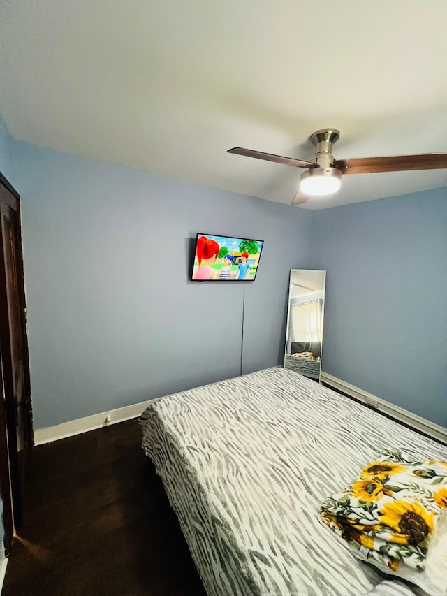 1116 Diamond Ave, Scranton, PA 18508 - bedroom featuring baseboards, ceiling fan, and dark wood-style floors