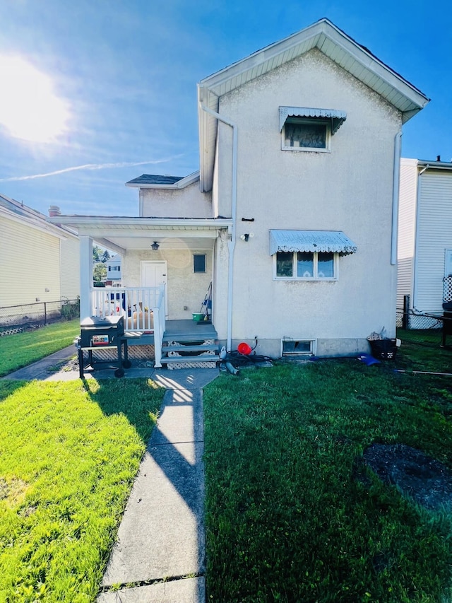 1116 Diamond Ave, Scranton, PA 18508 - rear view of property with a porch and stucco siding