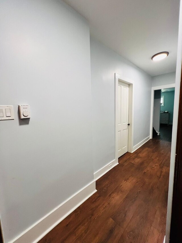 1116 Diamond Ave, Scranton, PA 18508 - hallway featuring dark wood finished floors and baseboards