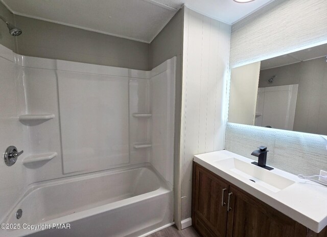 bathroom with vanity, bathtub / shower combination, and decorative backsplash