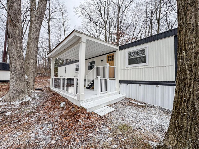 exterior space featuring covered porch