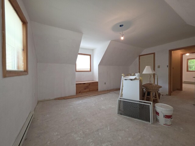 131 Pine Dr, Pocono Lake, PA 18347 - bonus room with vaulted ceiling and a baseboard radiator