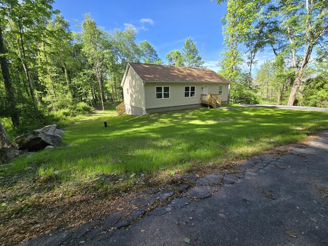 526 Crocus Dr, East Stroudsburg, PA 18301 - view of side of property with a lawn