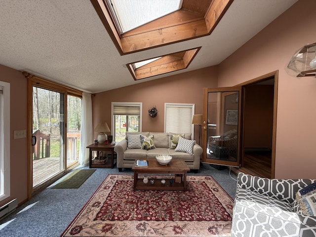 343 Echo Lake Rd, Tobyhanna, PA 18466 - carpeted living area with a baseboard radiator and lofted ceiling with skylight