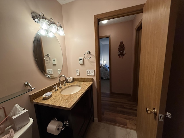 343 Echo Lake Rd, Tobyhanna, PA 18466 - half bathroom with tile patterned floors, ensuite bath, and vanity