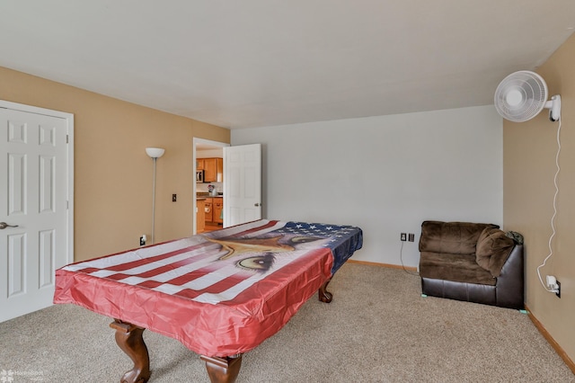 bedroom with baseboards, pool table, and carpet