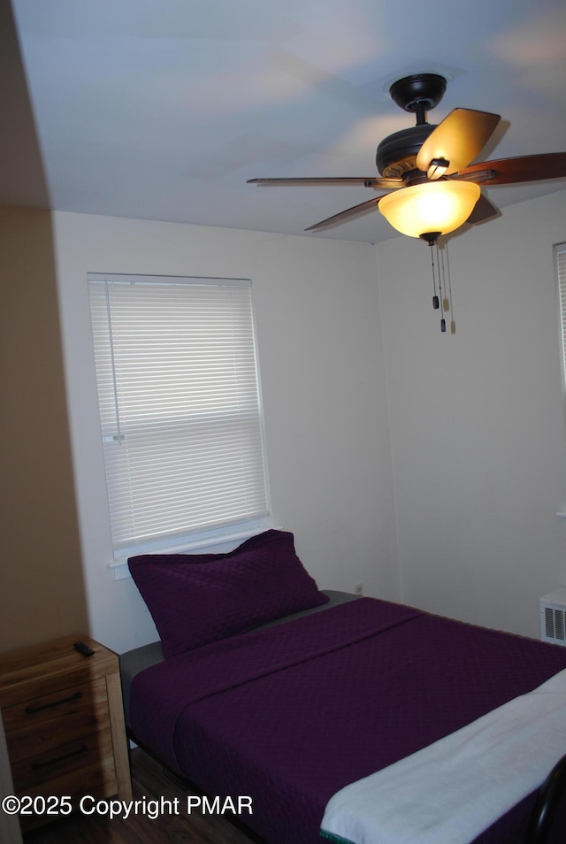 bedroom featuring ceiling fan