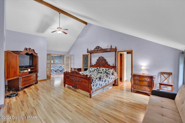 bedroom featuring beamed ceiling, high vaulted ceiling, wood finished floors, and a ceiling fan